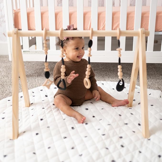 Poppyseed Play Wooden Baby Play Gym, Montessori Activity Center for Infants | Natural Wood Frame with 4 Hanging Toys | Baby Gym for Floor Play | Tummy Time & Early Development | 0–12 Months