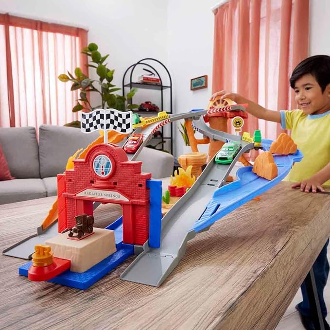 Mattel Disney and Pixar Cars Toy Playset, Lightning McQueen & Chicks Hicks & 2 Pitty Crew Vehicles, 2 Ways to Race, Race & Rescue Rescue Road Raceway