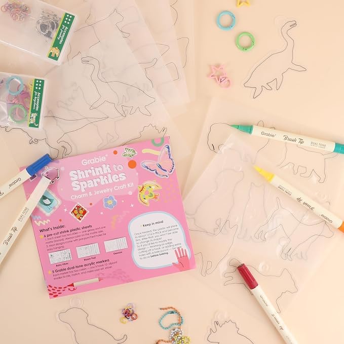 Grabie DIY Shrink Art Craft Kit Jewelry Making Kit for Kids Adults, 25+ Pre-Cut Shapes, 5 Dual-Tip Markers, Custom Charms, Pins, Rings, Keychains (Paws & Wings - Creative Freedom)