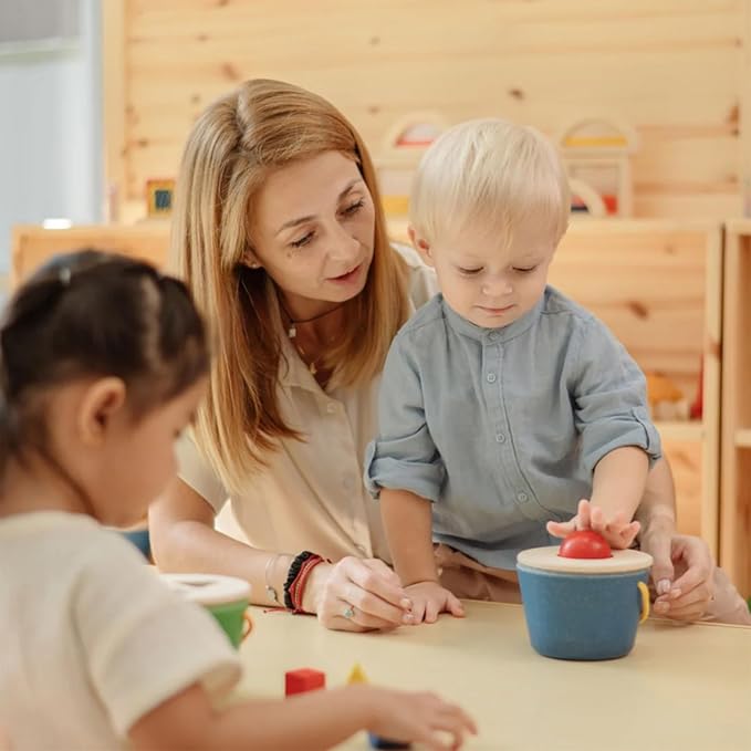 PlanToys® Pop 'N' Drop Bucket | Wooden Object Permanence Toy for Babies 6M+ | Montessori Interactive Ball Dropping Toy with Lid | Develops Hand-Eye Coordination, Motor Skills & Cause-&-Effect Learning