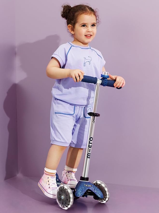 Micro Kickboard | Mini Deluxe Glitter LED Kids Scooter for Ages 2–5 | Children up to 110 lbs | 3 Wheel Lean-to-Steer Design | Adjustable T Bar | Motion-Activated PU LED Wheels | Swiss Design