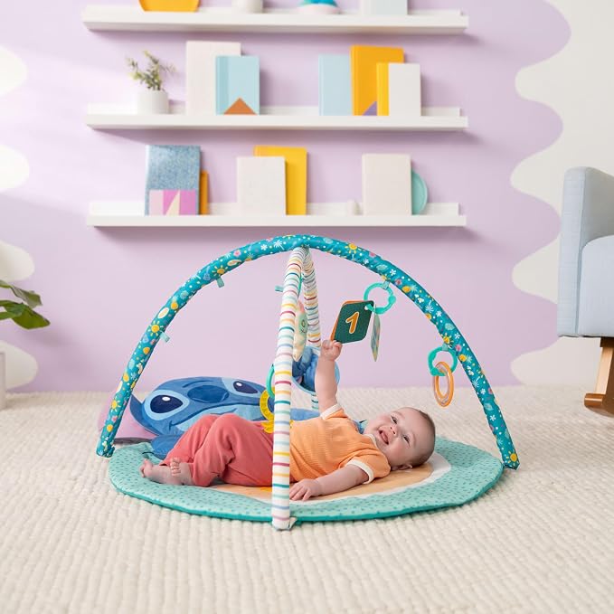 Bright Starts Disney Baby Stitch Party in Paradise Play Gym & Mat, Includes 5 Take Along Toys with Removable Stich Plush, Ages 0M+