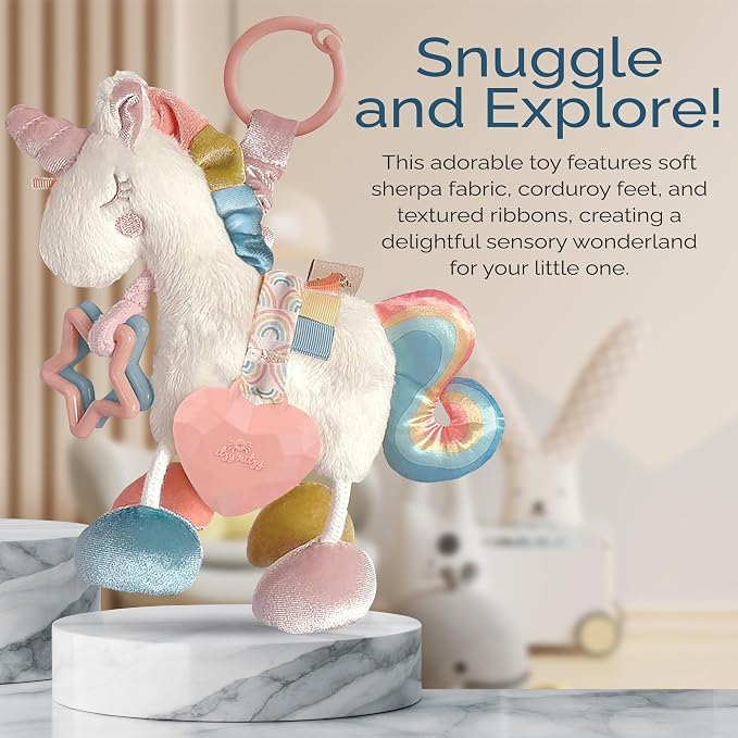 Itzy Ritzy Link & Love Toy for Stroller or Car Seat – Features Textured Ribbons, Crinkle Sounds, Clinking Rings & Silicone Teether – Designed For Ages 0 Months and Up (Unicorn)