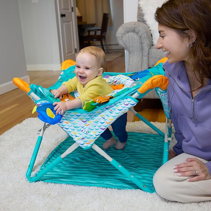 Bright Starts Disney Baby Finding Nemo Pop 'N Jump Portable Baby Jumper, Foldable Indoor/Outdoor Baby Jumper with Sensory Activities, Ages 6–12 Months