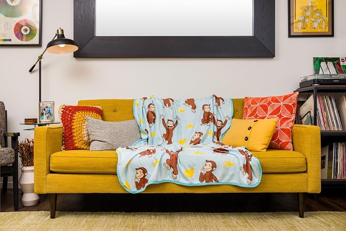 Silver Buffalo Curious George Monkey Banana 45" x 60" Fleece Throw, Soft and Cozy Blanket, 185 GSM