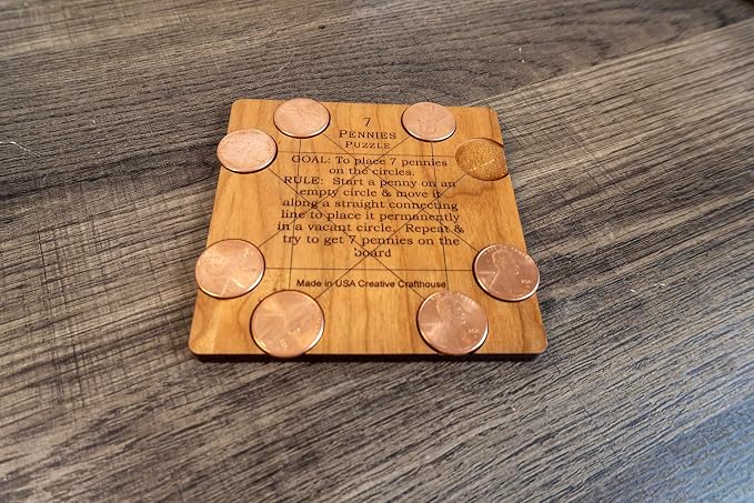Creative Crafthouse 7 Pennies Puzzle, Wood Coin Brain Teaser, Made in USA | The real US cents are included, nothing else to buy. Slide each one in a straight line to its circle. A 3.6 inch desk gift